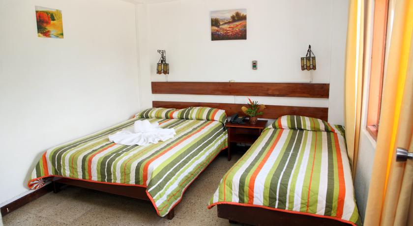 Hotel Puerto Ballesta Tonsupa Chambre photo